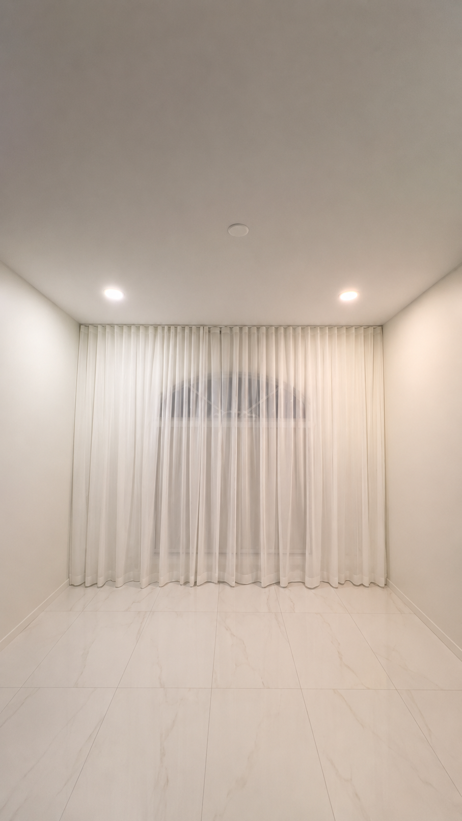 Custom shutters and shades in a luxury South Florida living room